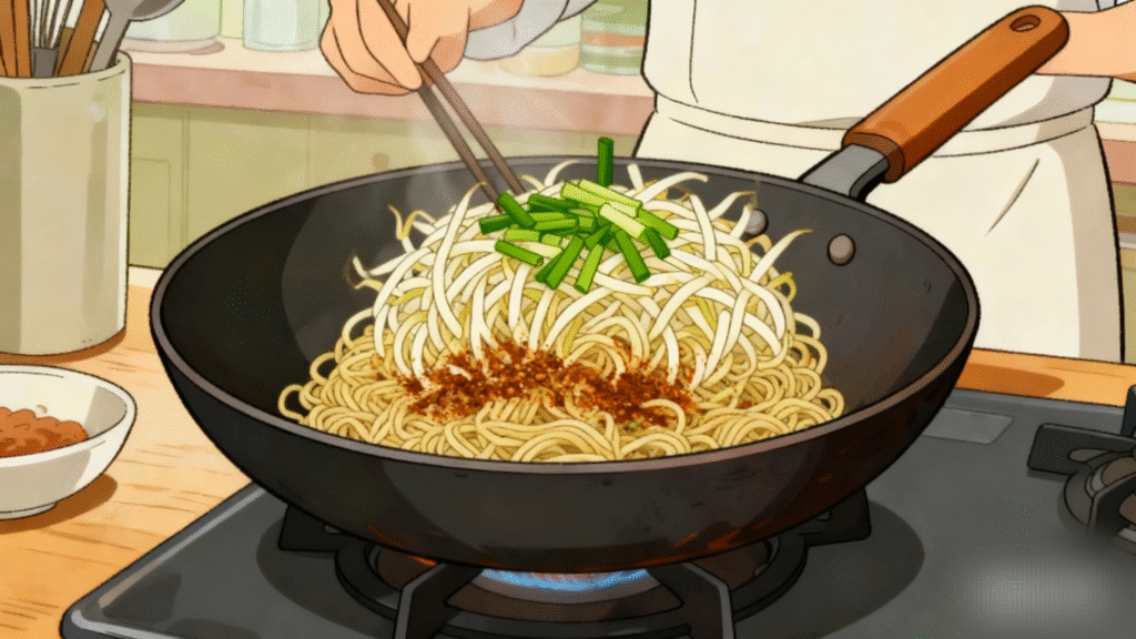 Fresh bean sprouts and green onions added to Pad Thai noodles for texture and freshness